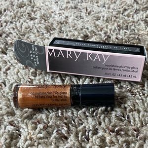 Mary Kay nourishine plus Beach Bronze lip gloss. New!